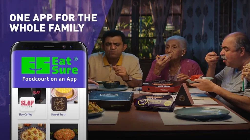 the EatSure app, a family eating delivered food on a dining table.