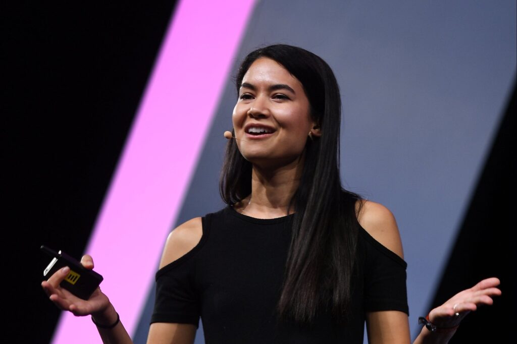 close up of Melanie Perkins, Canva CEO and co-founder, giving a talk on a stage