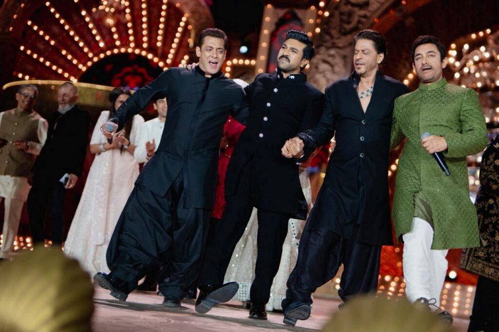 Actors Salman Khan, Ram Charan, Shah Rukh Khan and Aamir Khan perform during in the Ambani pre-wedding celebration.