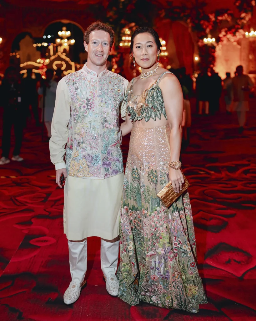 Mark Zuckerberg and his wife Priscilla Chan pose at the pre-wedding bash